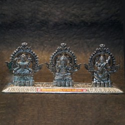 Lord Ganesha with Lakshmi Saraswathi sitting on peeta 