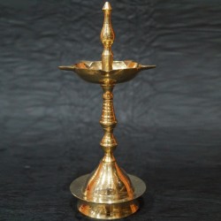 Brass diyas (lamps) for puja on festival decoration online