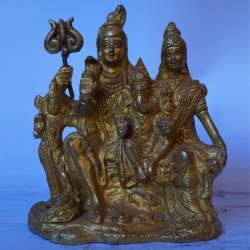 Blessing Lord Shiva with his family brass idol