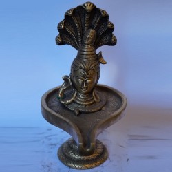Brass Shiva linga with shiva face idol