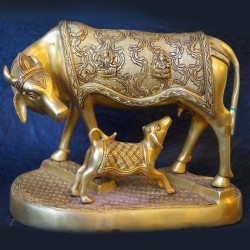 Beautiful cow with calf wearing Lakshmi Ganesha on top brass idol